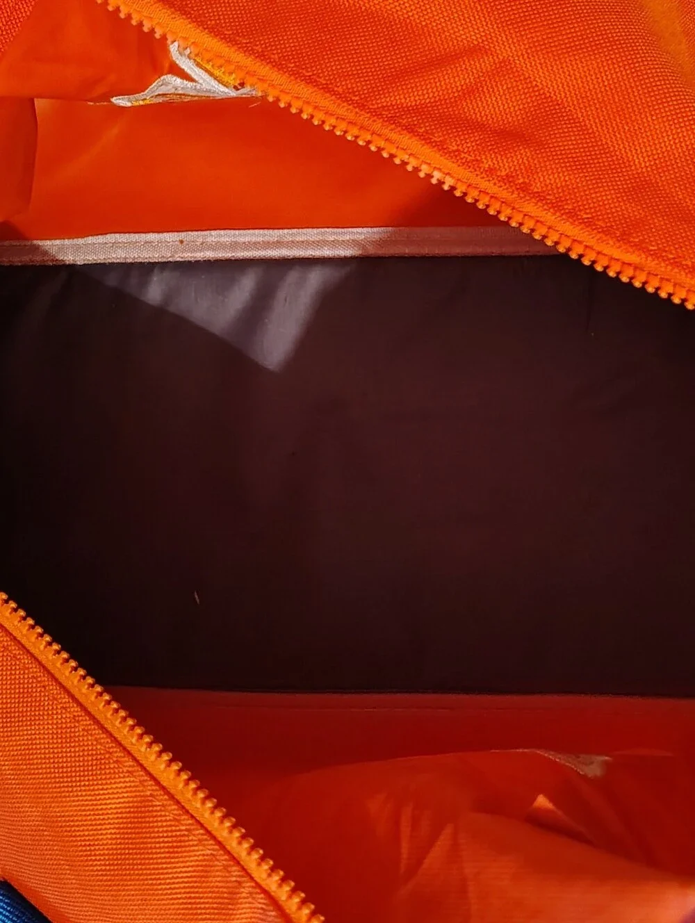 Emotional Baggage Orange Duffel Bag with Blue Handles